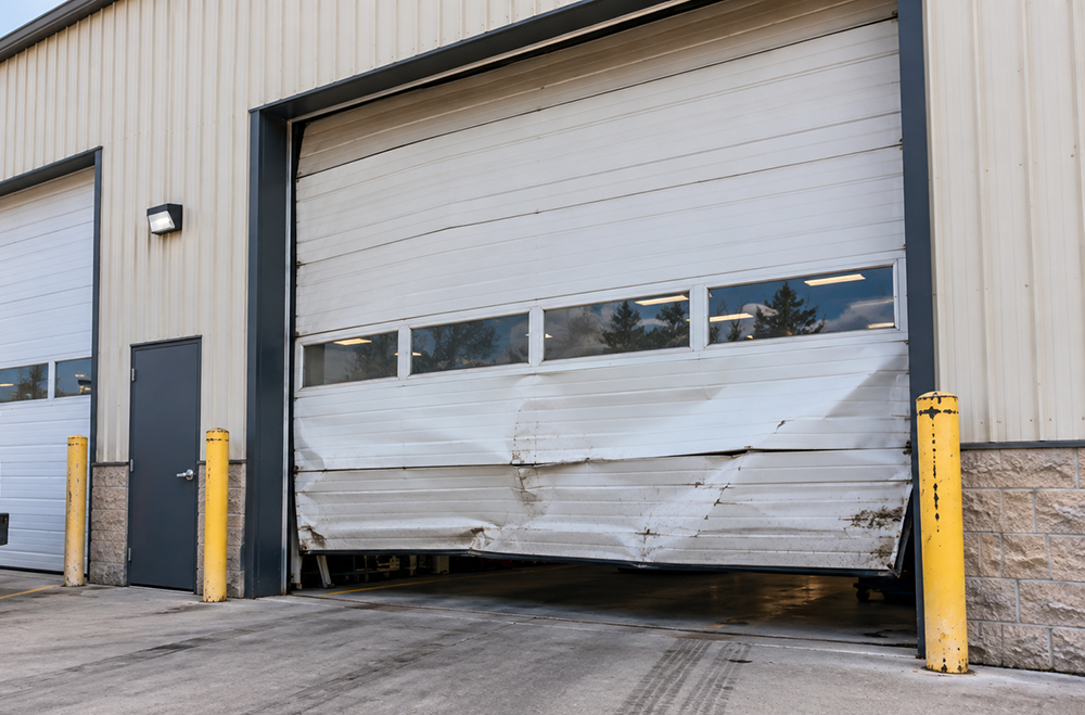 Commercial Garage door before repair